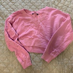 Cropped light pink sweatshirt